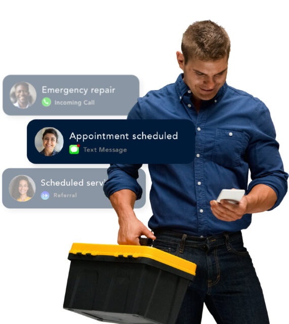 A service technician holding a toolbox is looking at his phone and scrolling through his many leads.